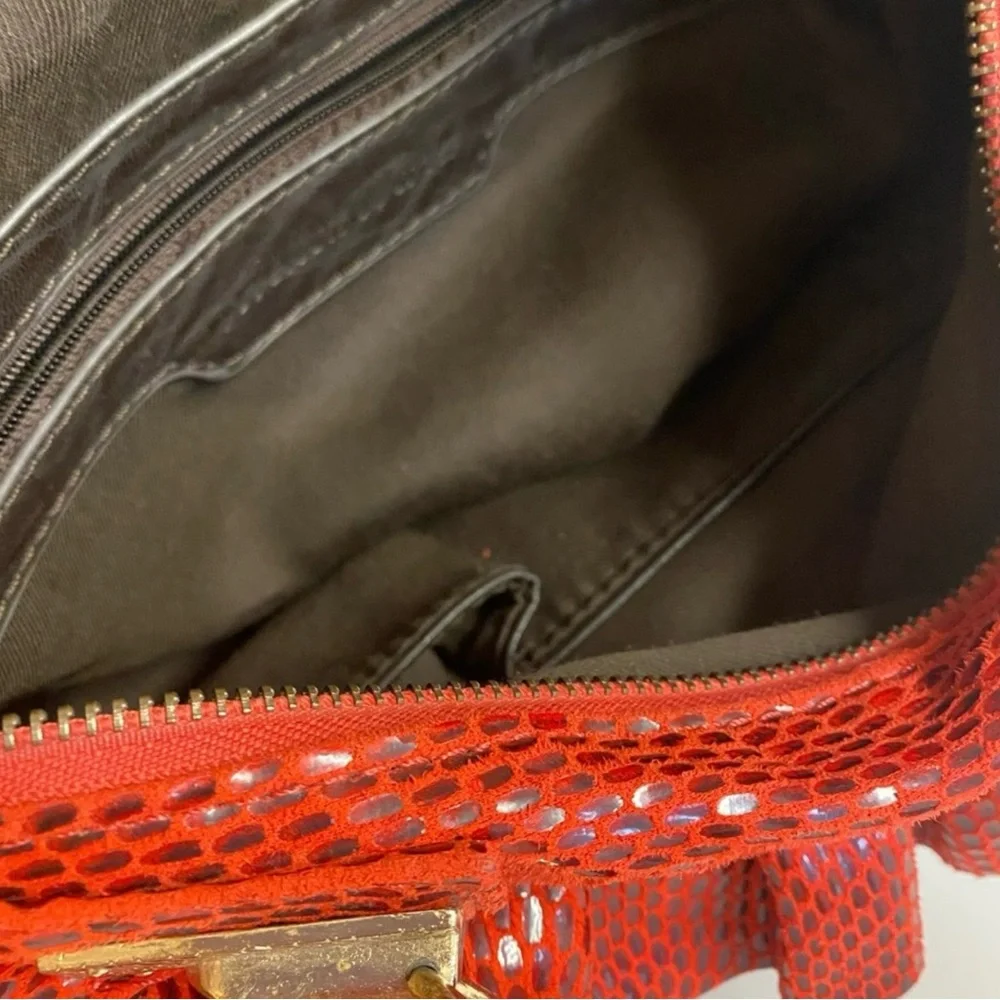 Mellow World-Red Ruffle Maximalist shoulder bag with snake print & extra strap.